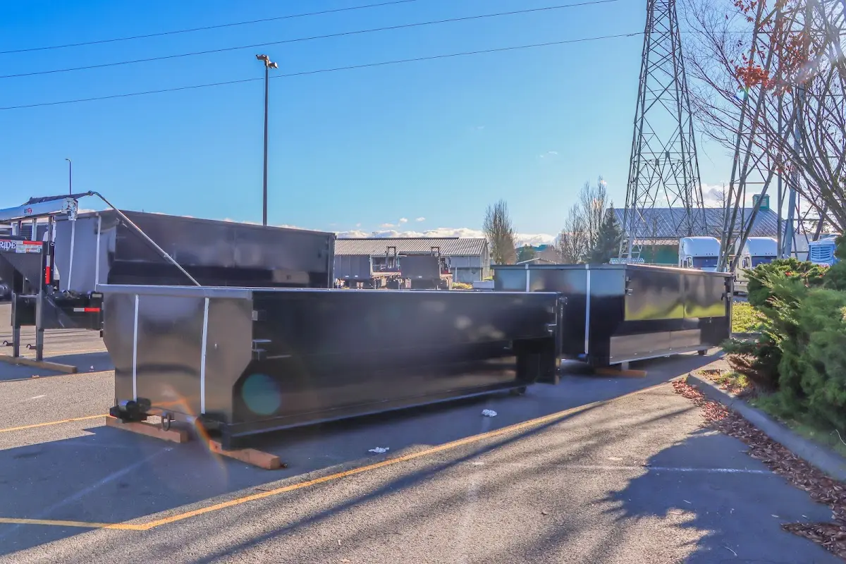 Roll-off dumpster ready for waste disposal at job site for 20 Yard Dumpster Rental in Needham